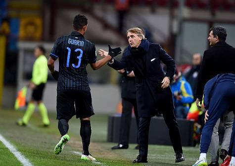 Mancini e Fredy Guarin