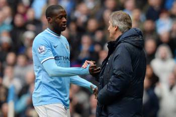 Pellegrini con Yaya Touré