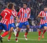 Rodrigo de Paul esulta con i compagni dell'Atletico Madrid