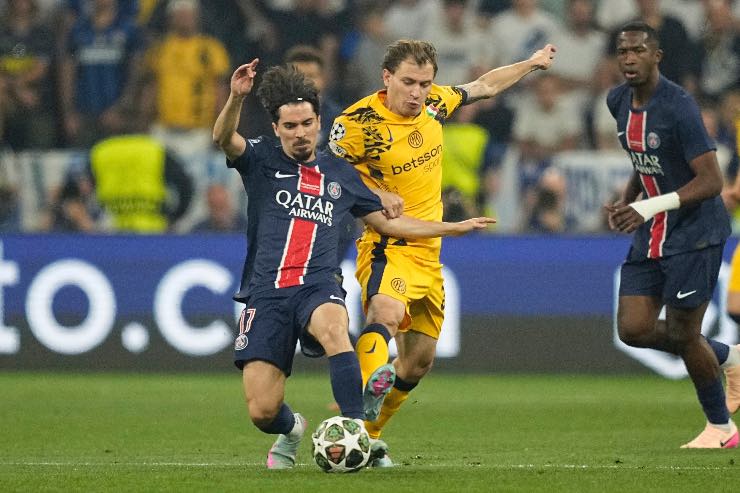 Barella su azione contro il PSG